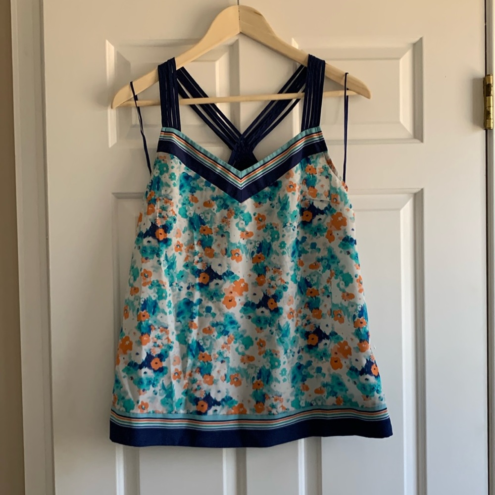 Small spaghetti strap tank with pretty detail and watercolor flower design